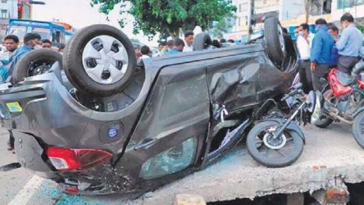 Hyderabad news, owner of new car sustain injuries as car fall from 1st floor of showroom kpn Hyderabad news, owner of new car sustain injuries as car fall from 1st floor of showroom kpn