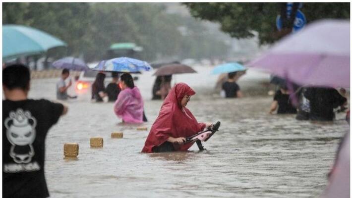 At least 25 dead as rains deluge central China's Henan province lns At least 25 dead as rains deluge central China's Henan province lns