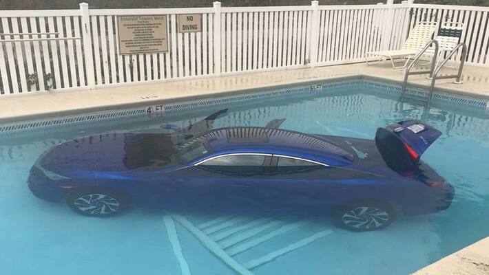 Teenager drives Infiniti G37X luxury sedan into a pool Teenager drives Infiniti G37X luxury sedan into a pool