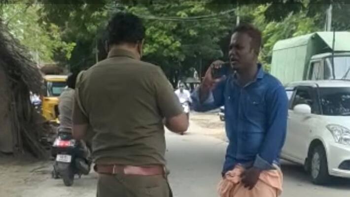 Hey leave .. this is my own town .. the rowdy threaten the police in the middle of the road .. shocking scene. Hey leave .. this is my own town .. the rowdy threaten the police in the middle of the road .. shocking scene.