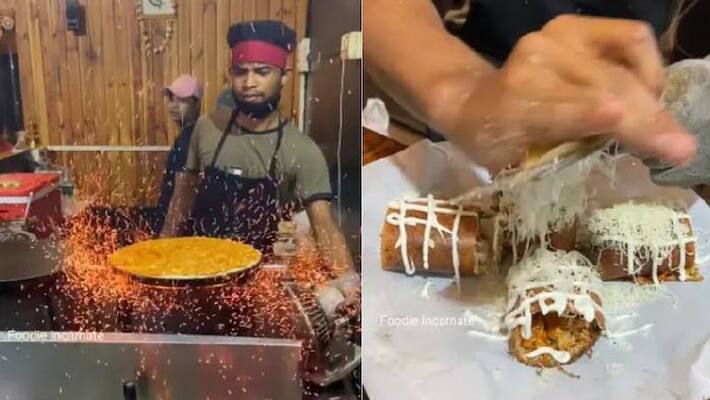 Man makes Fire Dosa with corn and cheese Man makes Fire Dosa with corn and cheese