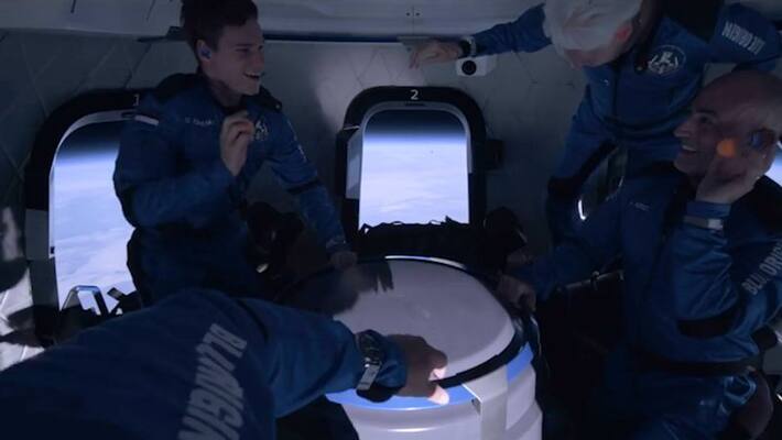 Jeff Bezos and crew tosses Skittle candy at each other on Blue origin space flight; Watch video-tgy Jeff Bezos and crew tosses Skittle candy at each other on Blue origin space flight; Watch video-tgy