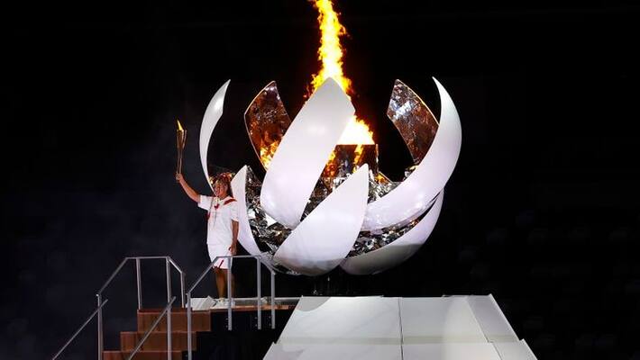 japan woman tennis player naomi osaka lights up tokyo olympic flame japan woman tennis player naomi osaka lights up tokyo olympic flame