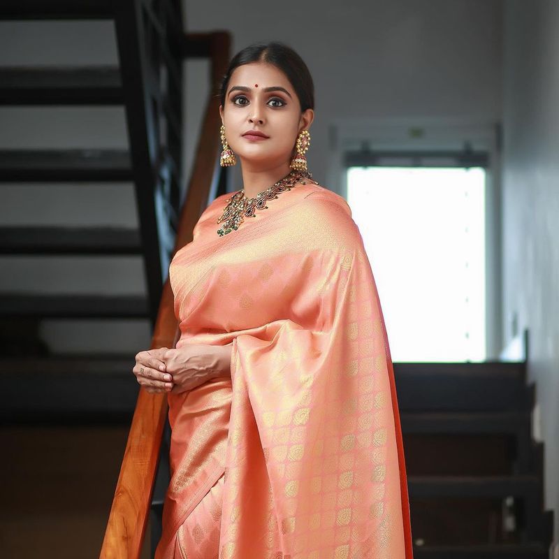 actress ramya nambeesan latest pattu saree cute photo gallery