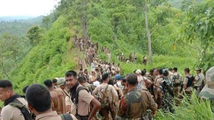 CRPF patrolling Assam Mizoram border trucks did not start running despite barrier was removed CRPF patrolling Assam Mizoram border trucks did not start running despite barrier was removed