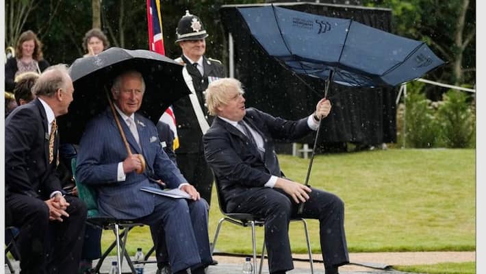 Boris Johnson struggles with his umbrella video goes viral gcw Boris Johnson struggles with his umbrella video goes viral gcw