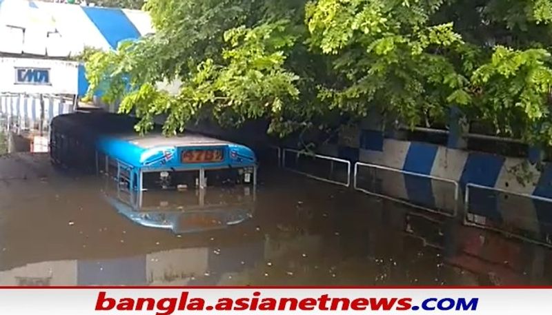 watch 10 photos of waterlogging in Kolkata bus is drowned in patipukur underpass bsm