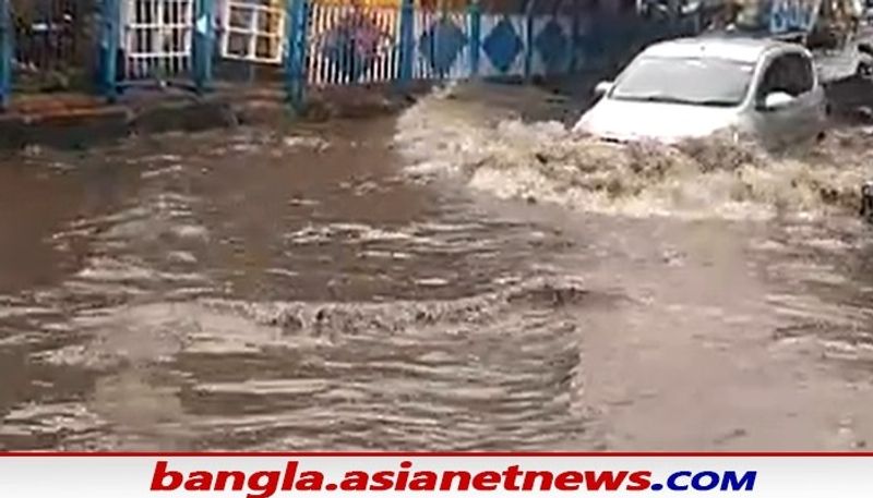 watch 10 photos of waterlogging in Kolkata bus is drowned in patipukur underpass bsm