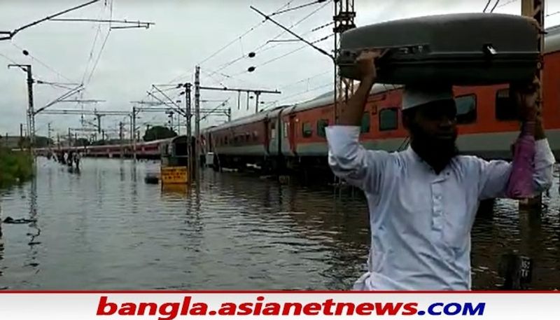 watch 10 photos of waterlogging in Kolkata bus is drowned in patipukur underpass bsm