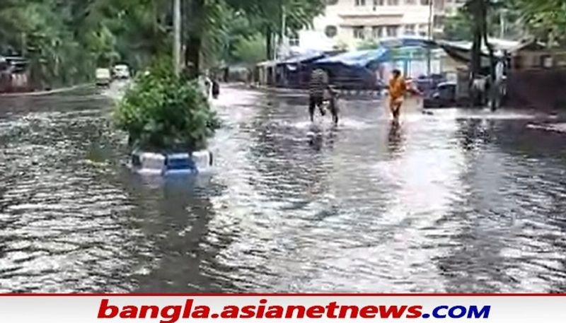 watch 10 photos of waterlogging in Kolkata bus is drowned in patipukur underpass bsm