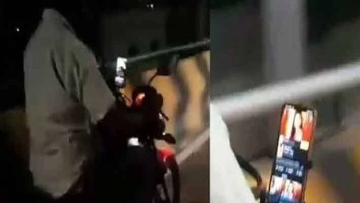 coimbatore driving motorcycle watching serial...police case register coimbatore driving motorcycle watching serial...police case register