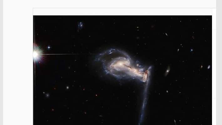 NASA Hubble images of galaxies in tug of war gcw NASA Hubble images of galaxies in tug of war gcw