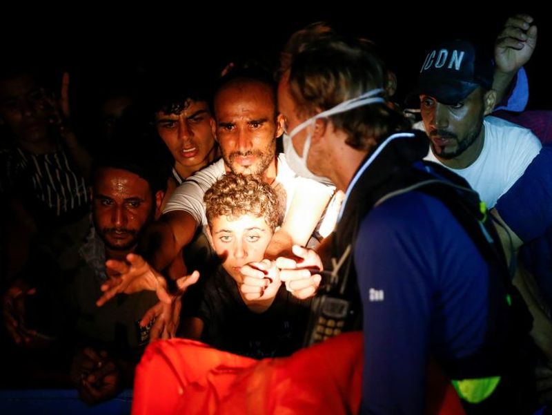 394 people rescued from a refugee boat in Mediterranean Sea
