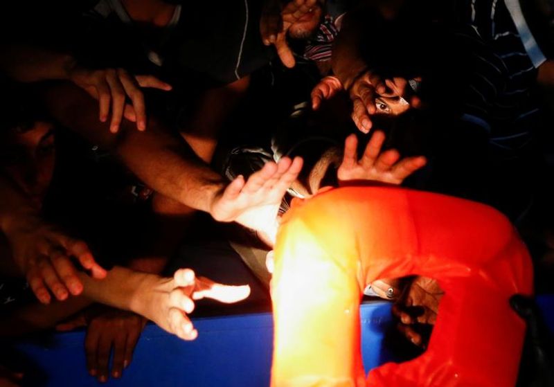 394 people rescued from a refugee boat in Mediterranean Sea