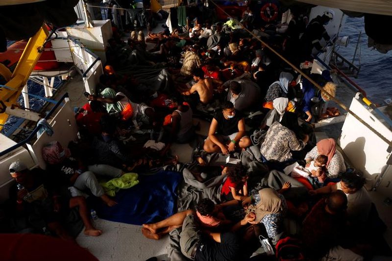394 people rescued from a refugee boat in Mediterranean Sea