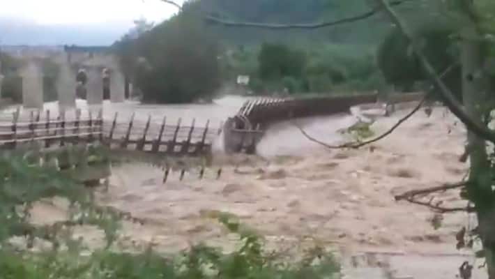 Madhya Pradesh: Terrifying video of bridge being swept away in flood fury goes viral-tgy Madhya Pradesh: Terrifying video of bridge being swept away in flood fury goes viral-tgy
