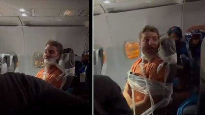 Shocking Viral Video of passenger misbehavior with lady attendant in flight Shocking Viral Video of passenger misbehavior with lady attendant in flight
