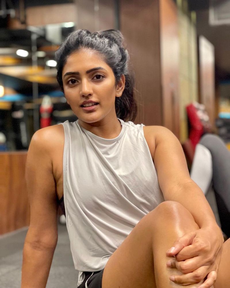 eesha rebba thighs show with workout small dress looks stunning