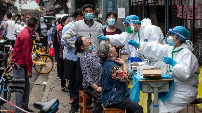 coronavirus in china:  China finds new coronavirus subtype as daily cases exceed 13,000