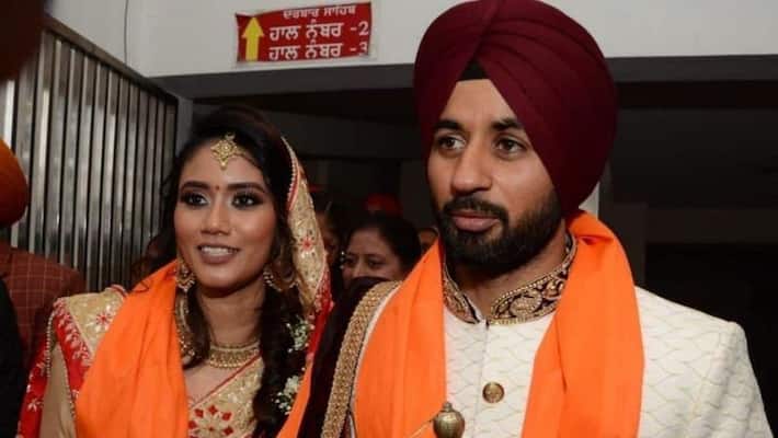 This medal is Manpreet Singh's marriage gift to wife Illi Najwa Saddique This medal is Manpreet Singh's marriage gift to wife Illi Najwa Saddique