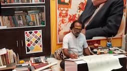 Renowned Phad artist from Kalyan Joshi is making Phad paintings on the themes of Covid 19 and Tokyo Olympics these days