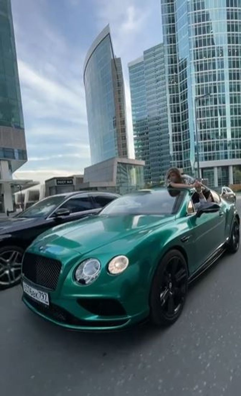 Man Drives With Girlfriend Tied To Roof In Bizarre 'Trust Test' In Russia
