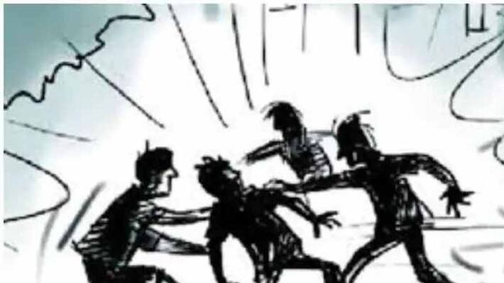 woman attacks on corporators husband with footwear in Nizamabad woman attacks on corporators husband with footwear in Nizamabad