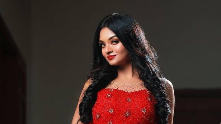 Surya Menon shares super photoshoot pictures in red gown Surya Menon shares super photoshoot pictures in red gown