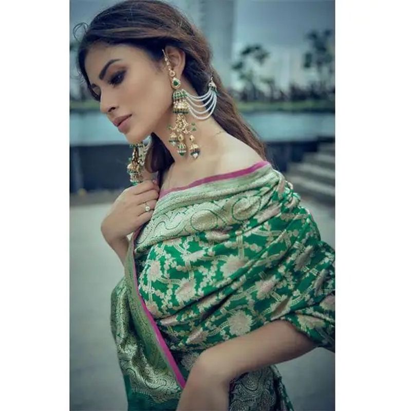 Did Mouni Roy forget her blouse draped in Bengali saree