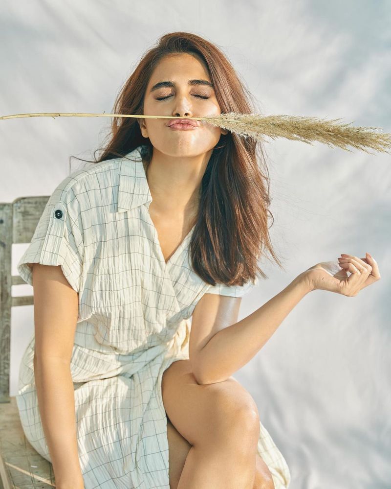 pooja hegde shared cute pics with tighs show and trivikram feel pooja legs golden