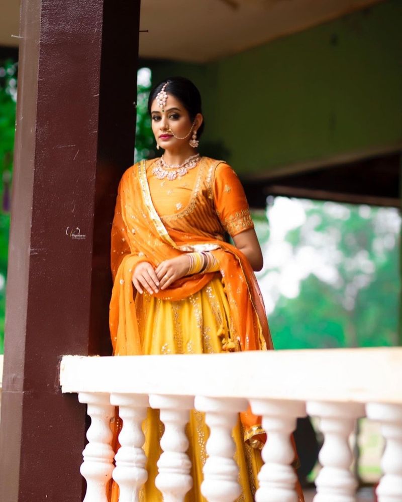 dhee fame priyamani ready to like princess mitrvinda orange lehanga photos viral