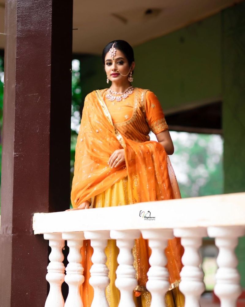 dhee fame priyamani ready to like princess mitrvinda orange lehanga photos viral