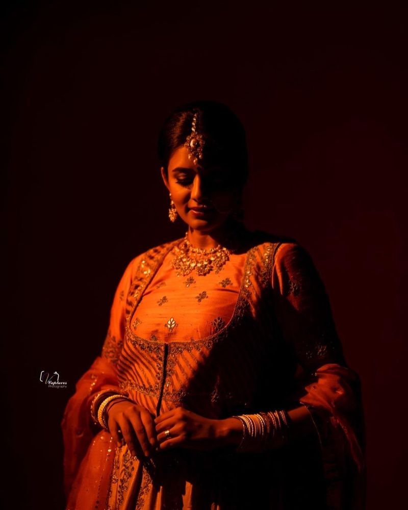 dhee fame priyamani ready to like princess mitrvinda orange lehanga photos viral