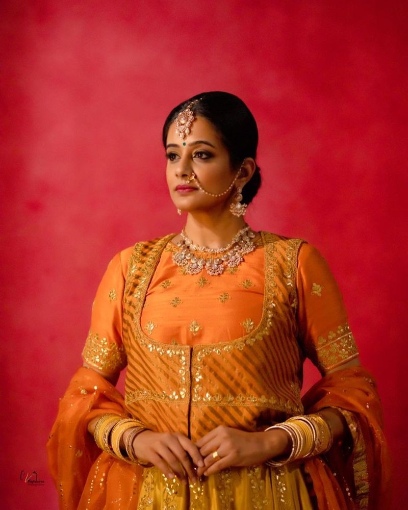 dhee fame priyamani ready to like princess mitrvinda orange lehanga photos viral