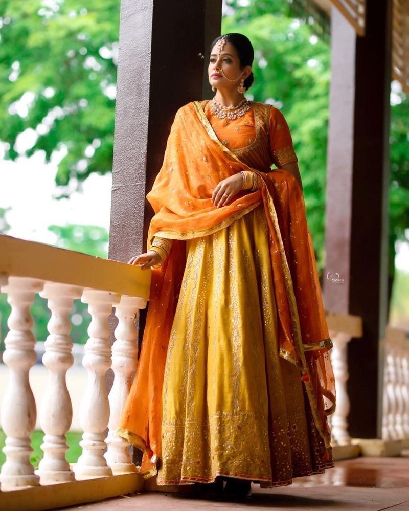 dhee fame priyamani ready to like princess mitrvinda orange lehanga photos viral