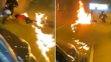 Watch Motorcycle riders perform stunts on mid-road in US; ends up burning their bikes-tgy Watch Motorcycle riders perform stunts on mid-road in US; ends up burning their bikes-tgy