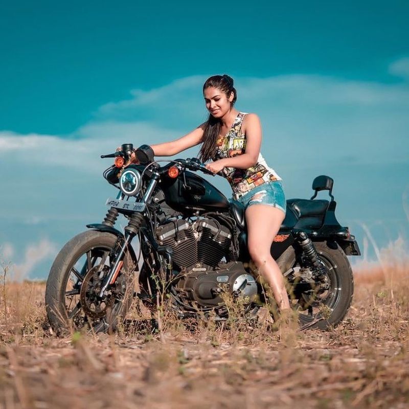 biggboss divi thigh show with harley davidson bike photo shoot viral