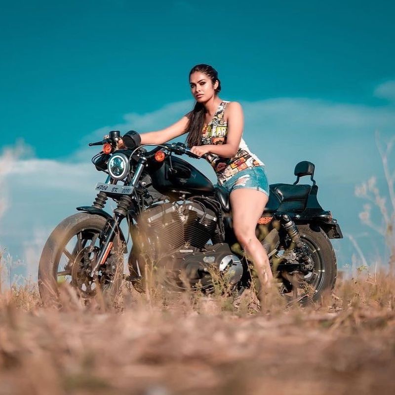 biggboss divi thigh show with harley davidson bike photo shoot viral