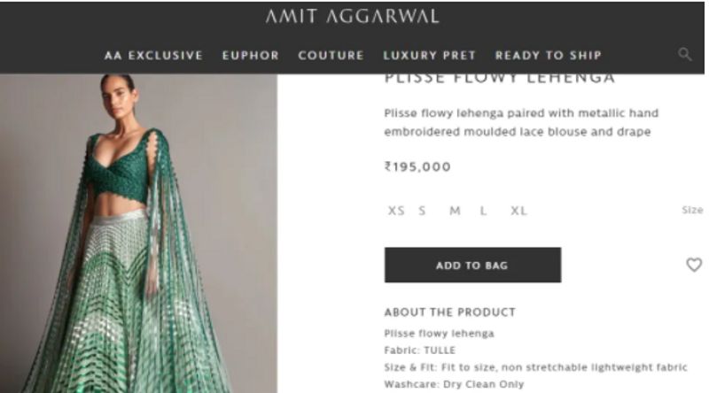 Madhuri Dixit in 2 lakh futuristic traditional lehenga can get you 2 Apple Macbook dpl