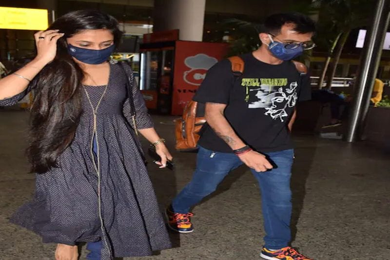 dhanashree verma receive her husband yuzvendra chahal in airport welcome by hug