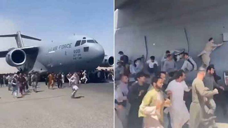 2 people falling off plane kabul airport
