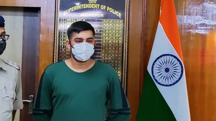 fake ips officer arrested in Midnapore recovered Revolver holder bmm fake ips officer arrested in Midnapore recovered Revolver holder bmm