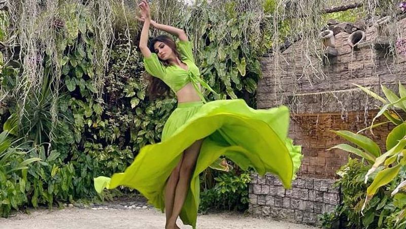 mouni roy looks stunning in bold dress enjoying holidays at beach
