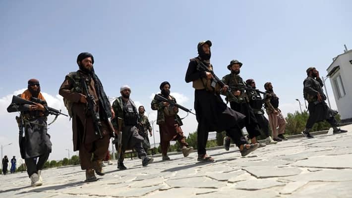 watch viral video Taliban tie man s hand for displaying afghan national flag on car bsm watch viral video Taliban tie man s hand for displaying afghan national flag on car bsm