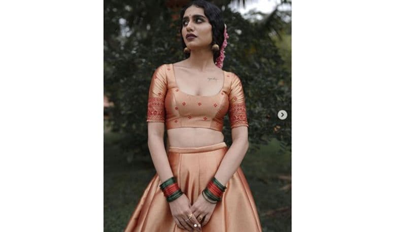 Onam Special5 looks of Priya Prakash Varrier in Pattu Pavadai and Kasavu saree RCB