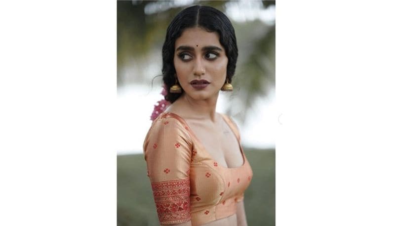 Onam Special5 looks of Priya Prakash Varrier in Pattu Pavadai and Kasavu saree RCB