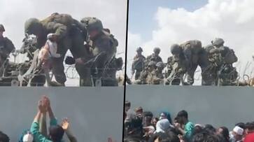 Afghan conflict: Infant handed to US troops over Kabul airport wired fence treated, reunited with family-dnm Afghan conflict: Infant handed to US troops over Kabul airport wired fence treated, reunited with family-dnm