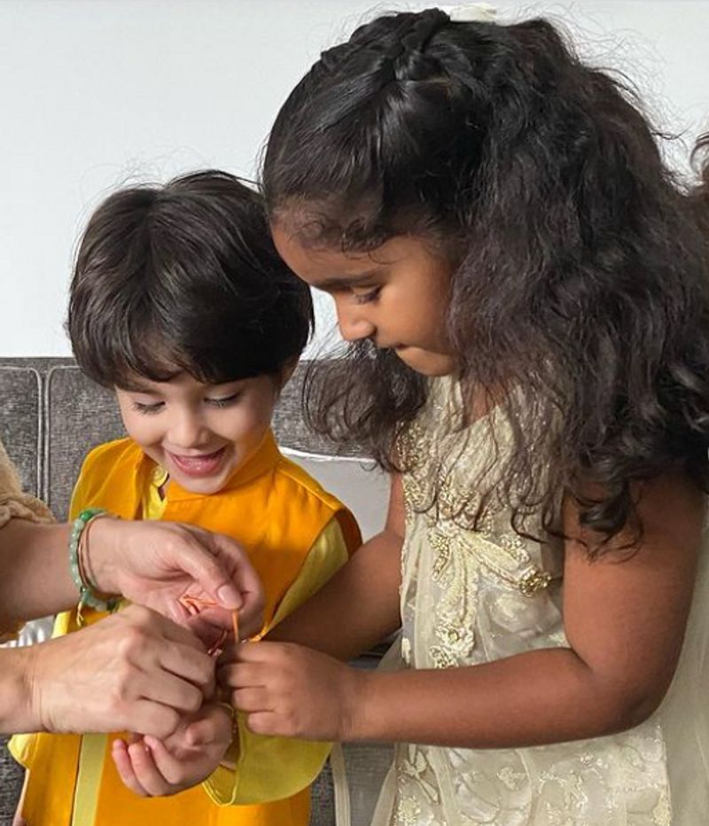 Sunny Leone daughter Nisha tie rakhis on their security in charge Yusuf Ibrahim dpl