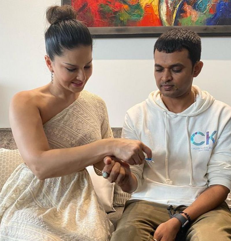 Sunny Leone daughter Nisha tie rakhis on their security in charge Yusuf Ibrahim dpl