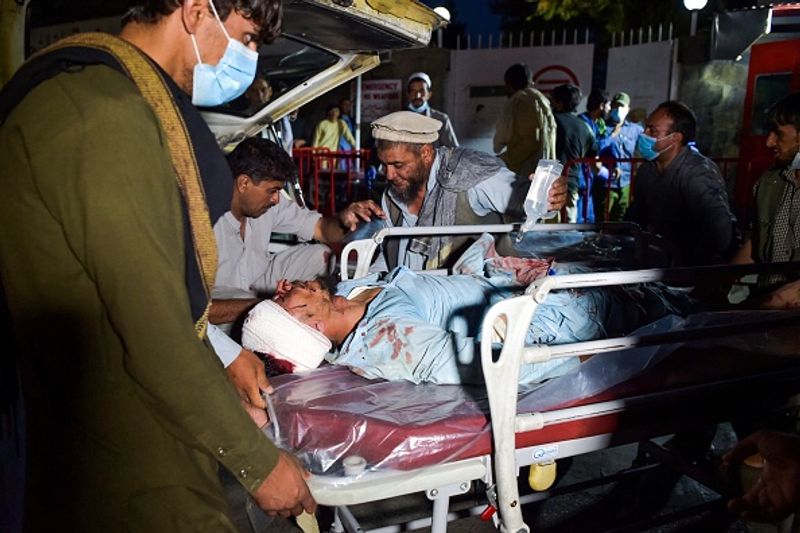 Kabul blast America will retaliate at the right place at the right time joe biden says